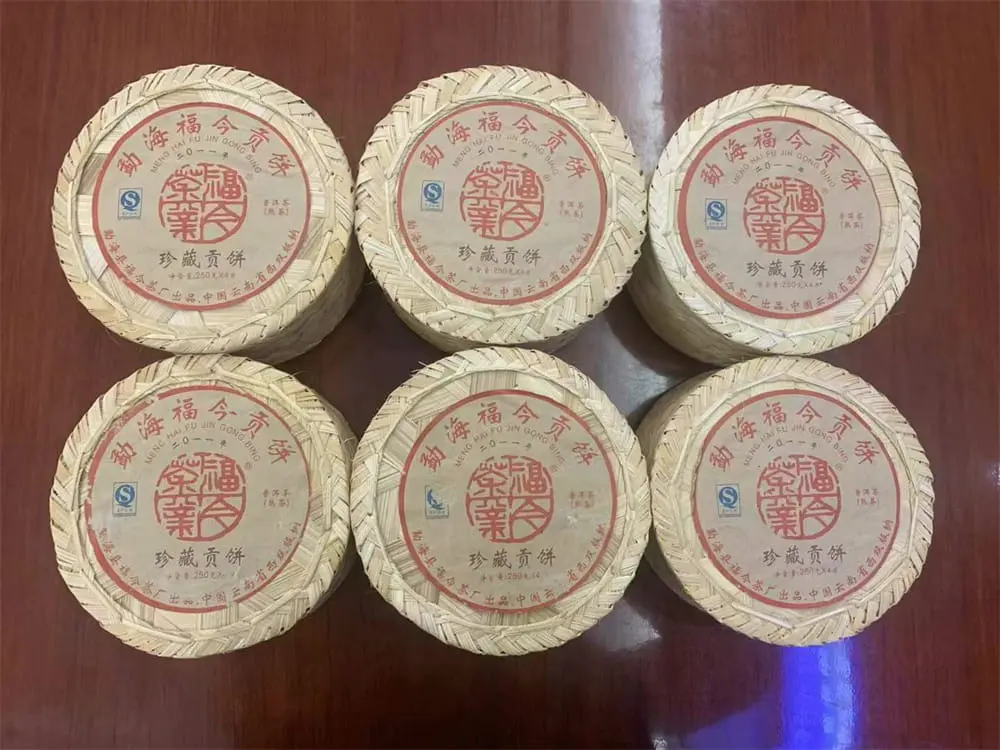 防城港回收福今普洱茶2011年生茶熟茶